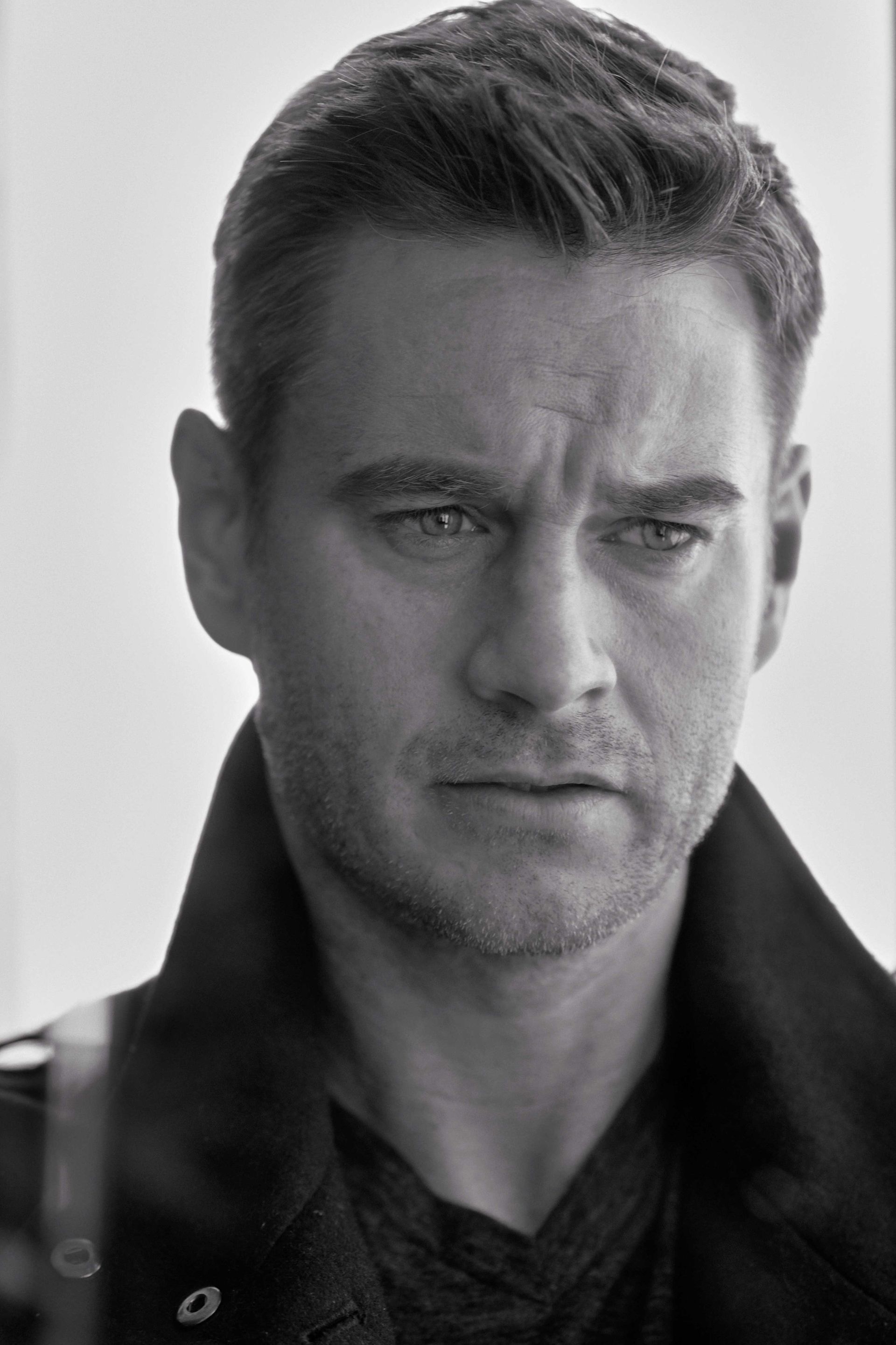 Clark Moore — black and white dramatic headshot